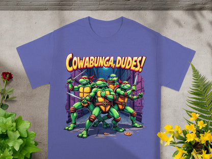 Teenage Mutant Ninja Turtles pose with swords and pizza text "Cowabunga, Dudes!".