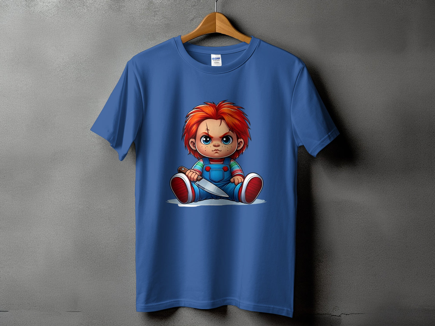 Blue t-shirt featuring a cartoon illustration of Chucky holding a knife.