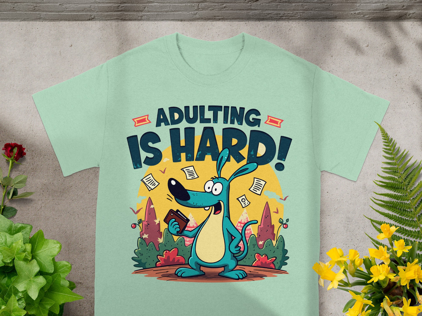 T-shirt with cartoon dog and text "Adulting Is Hard!"