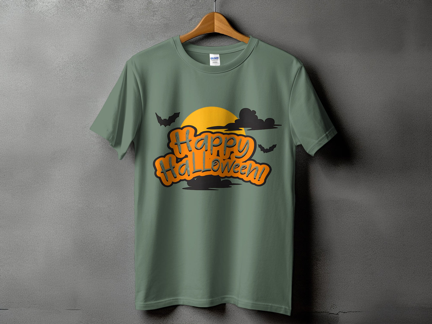 Green t-shirt with "Happy Halloween" text, bats, clouds, and orange sun.