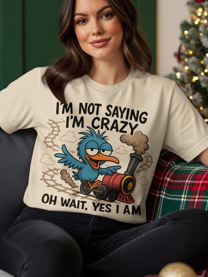 T-shirt with blue bird riding a train, text says "I'm Not Saying I'm Crazy Oh Wait, Yes I Am".