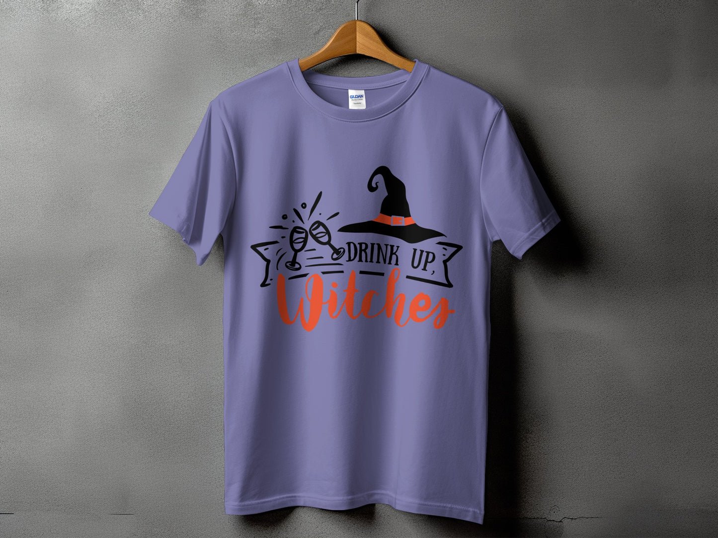 Purple t-shirt with a witch hat, clinking glasses, and text "DRINK UP, Witches".