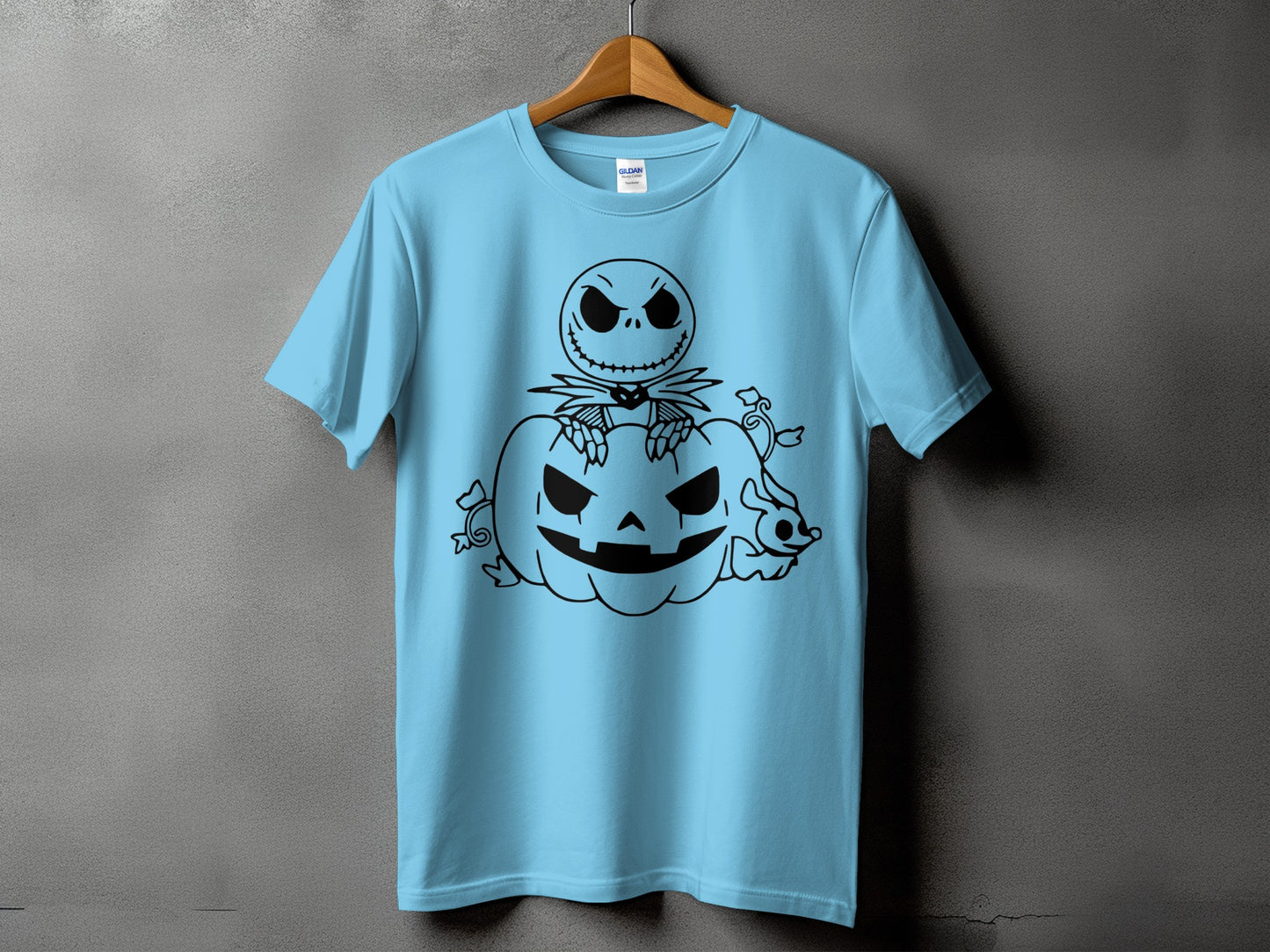 Light blue t-shirt with black Jack Skellington and pumpkin Halloween graphic.