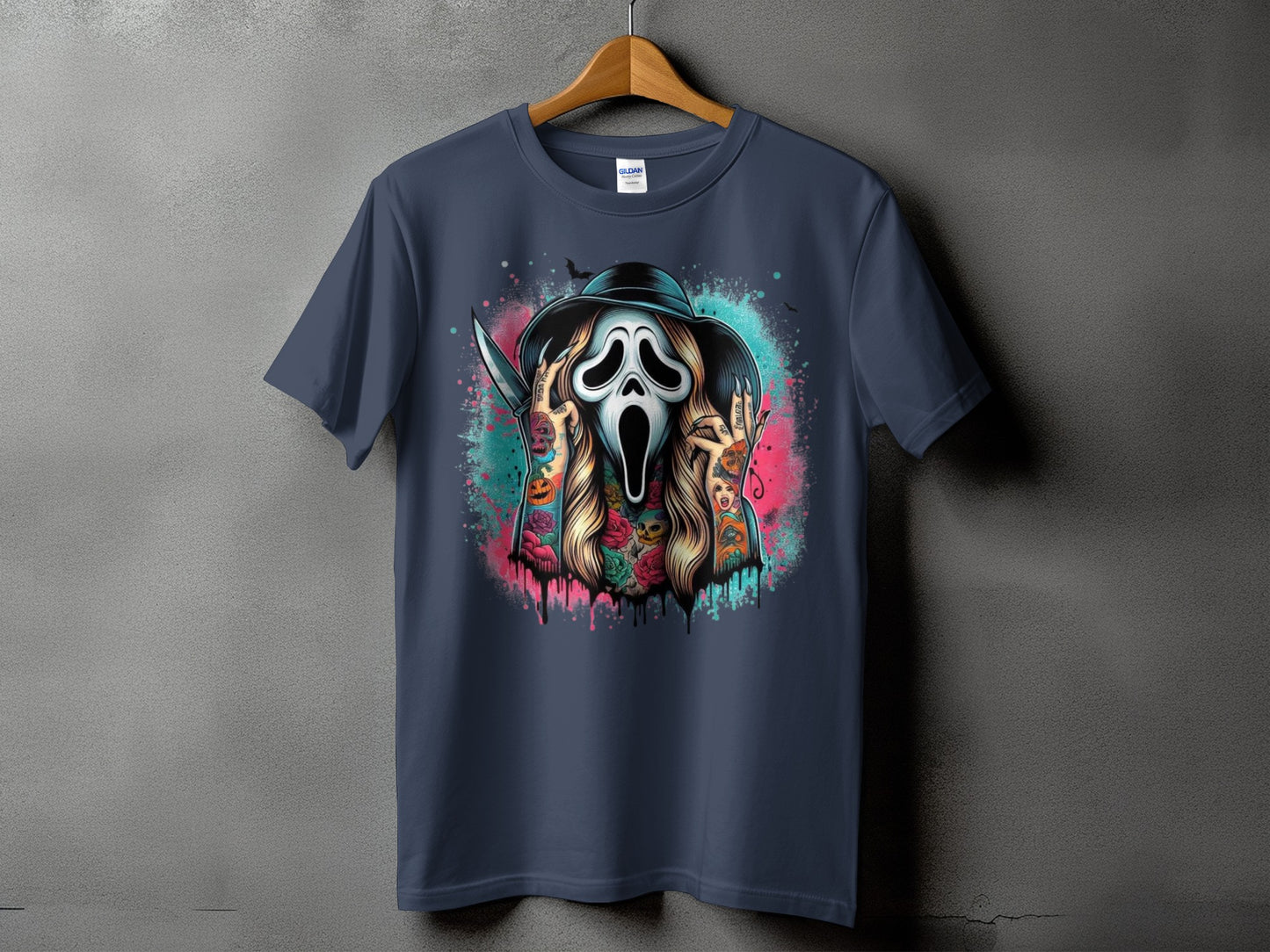 Dark t-shirt with graphic of a scream mask character with tattoos and knife.