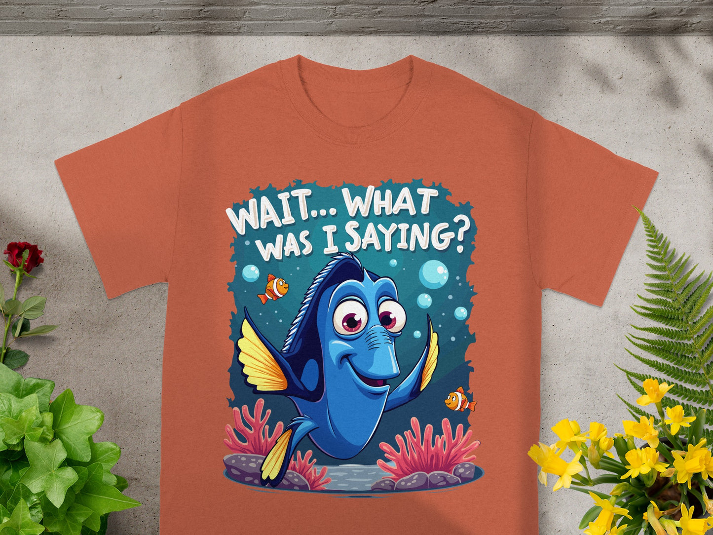 Dory from Finding Nemo on a coral reef, with text "WAIT... WHAT WAS I SAYING?".