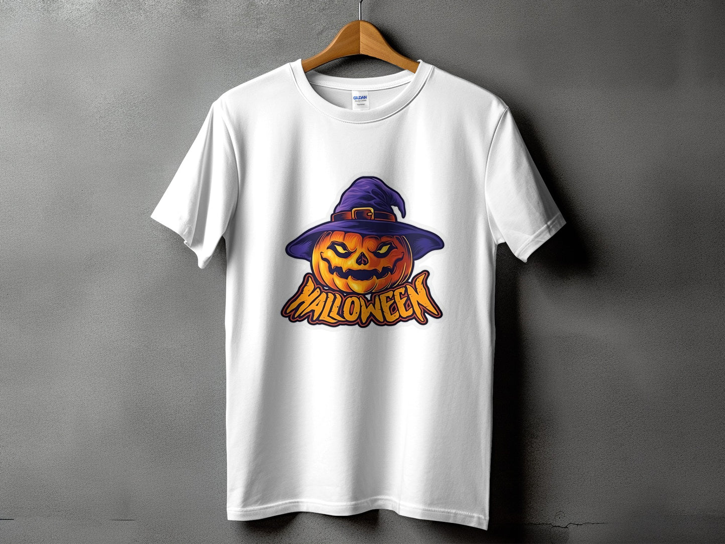 White t-shirt with a Halloween pumpkin wearing a witch hat and text.