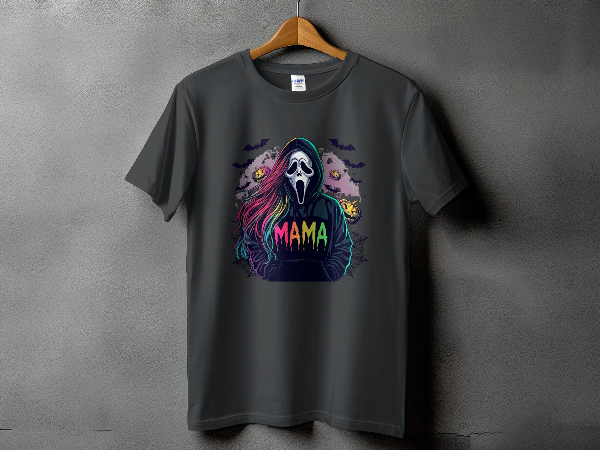 Dark grey t-shirt featuring a ghost mask and "MAMA" text with Halloween pumpkins and bats.