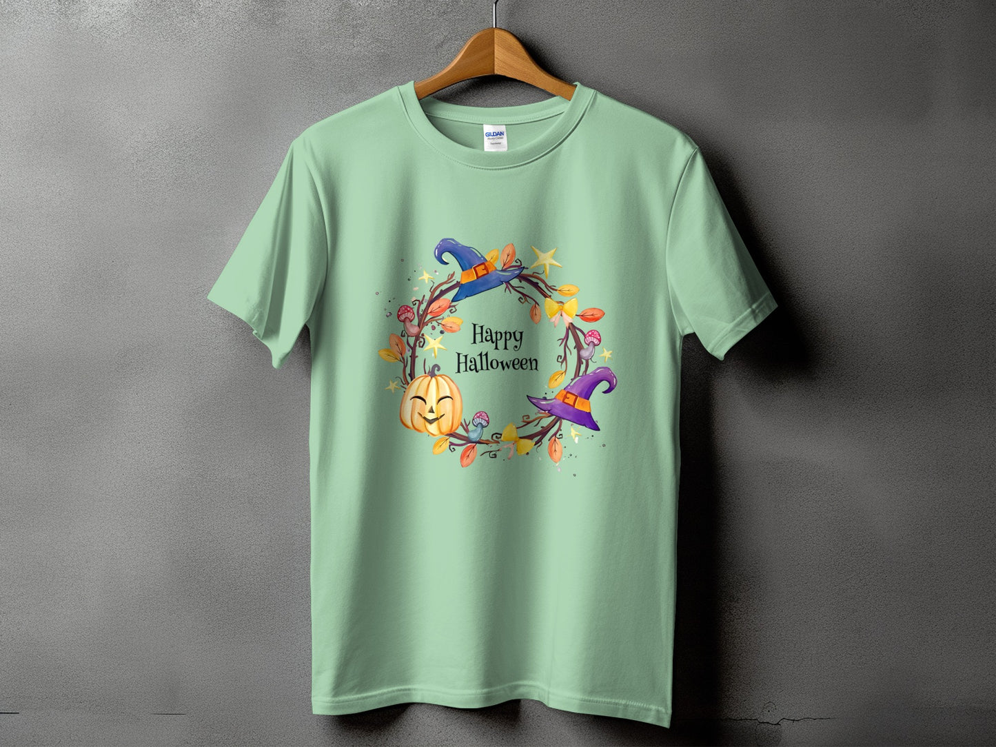 Light green t-shirt with "Happy Halloween" text and a Halloween wreath graphic.