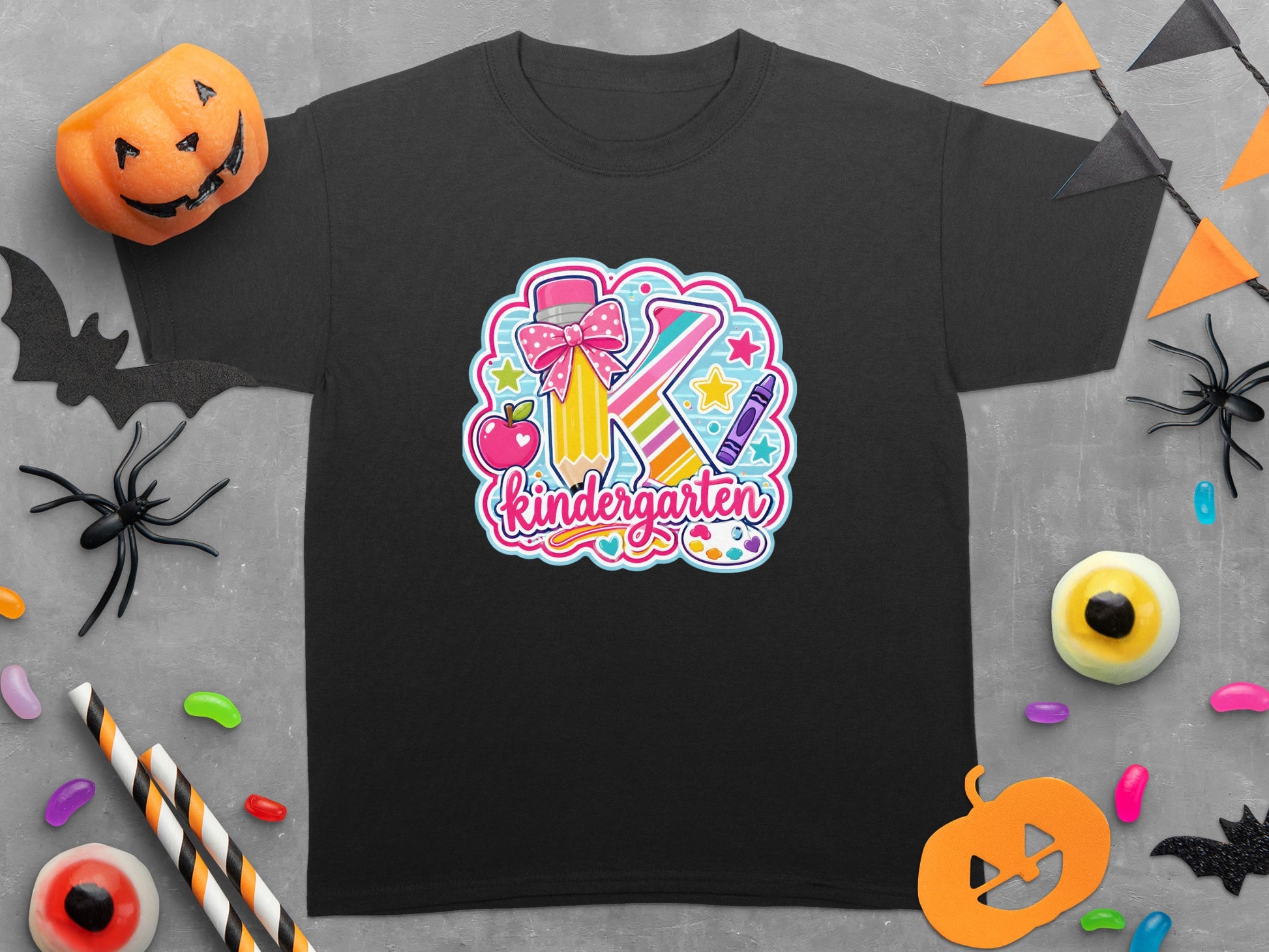 Black t-shirt with "Kindergarten" text and a large letter K with school supplies.