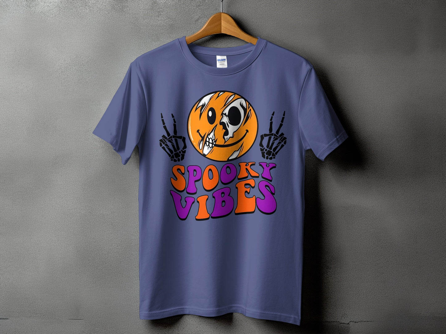 Purple t-shirt with a ripped smiley face, skeleton hands, and text reading "Spooky Vibes".