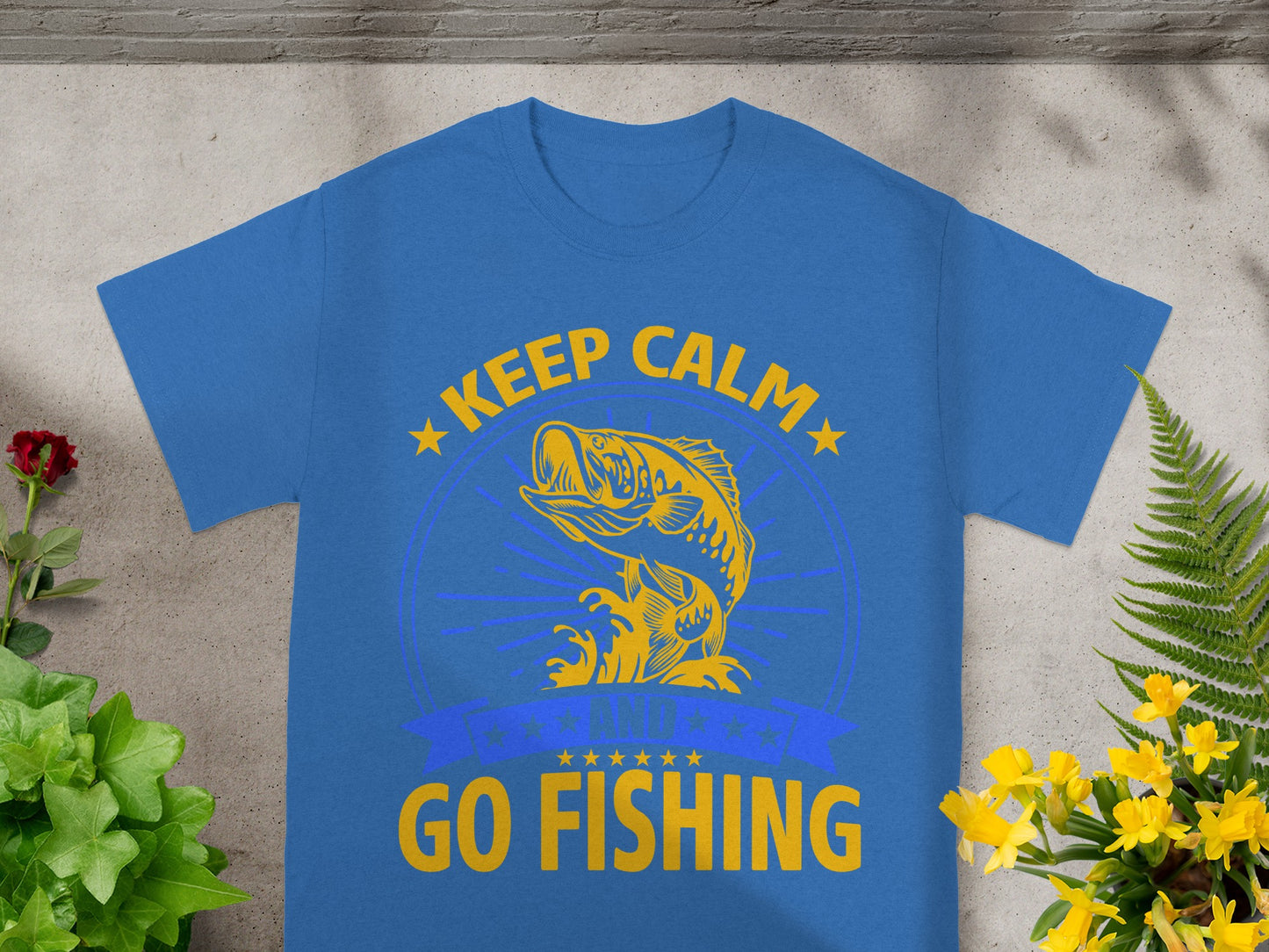Blue t-shirt with "Keep Calm Go Fishing" text and a fish graphic.