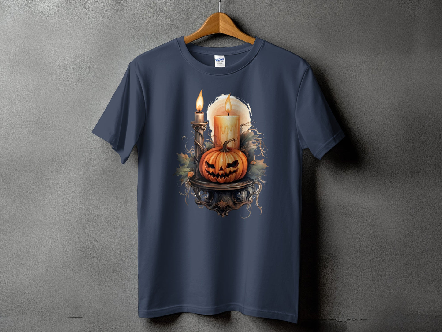 Dark blue t-shirt with a Halloween design featuring a carved pumpkin and candles.