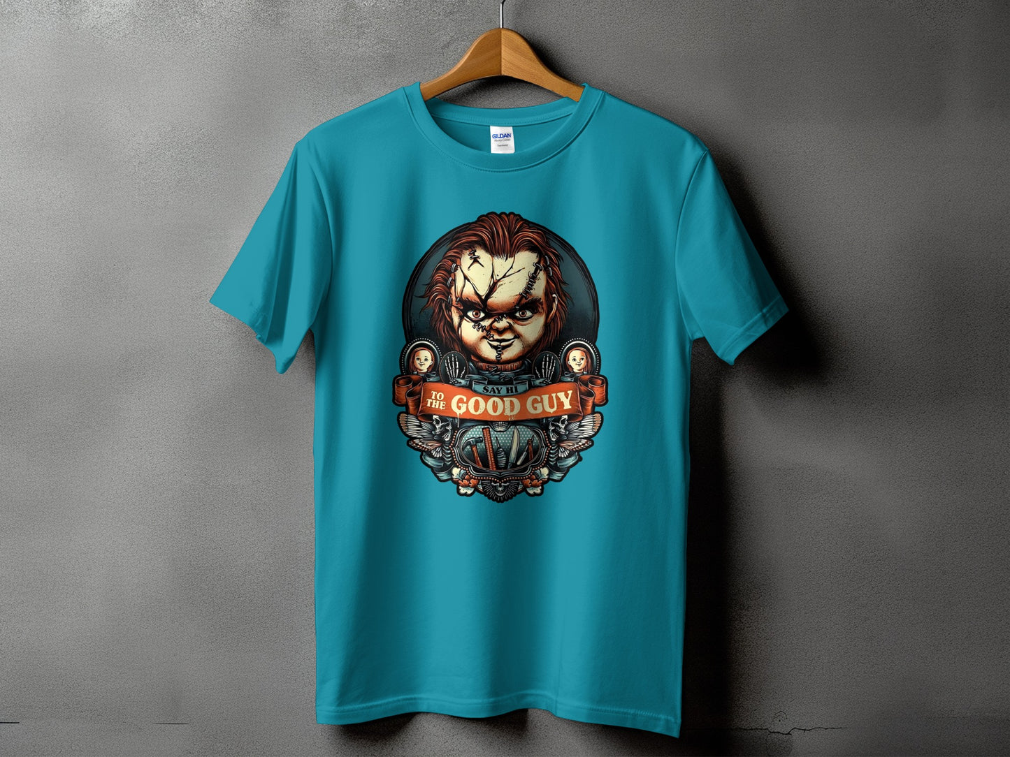 Teal t-shirt featuring Chucky with "Say Hi To The Good Guy" text.