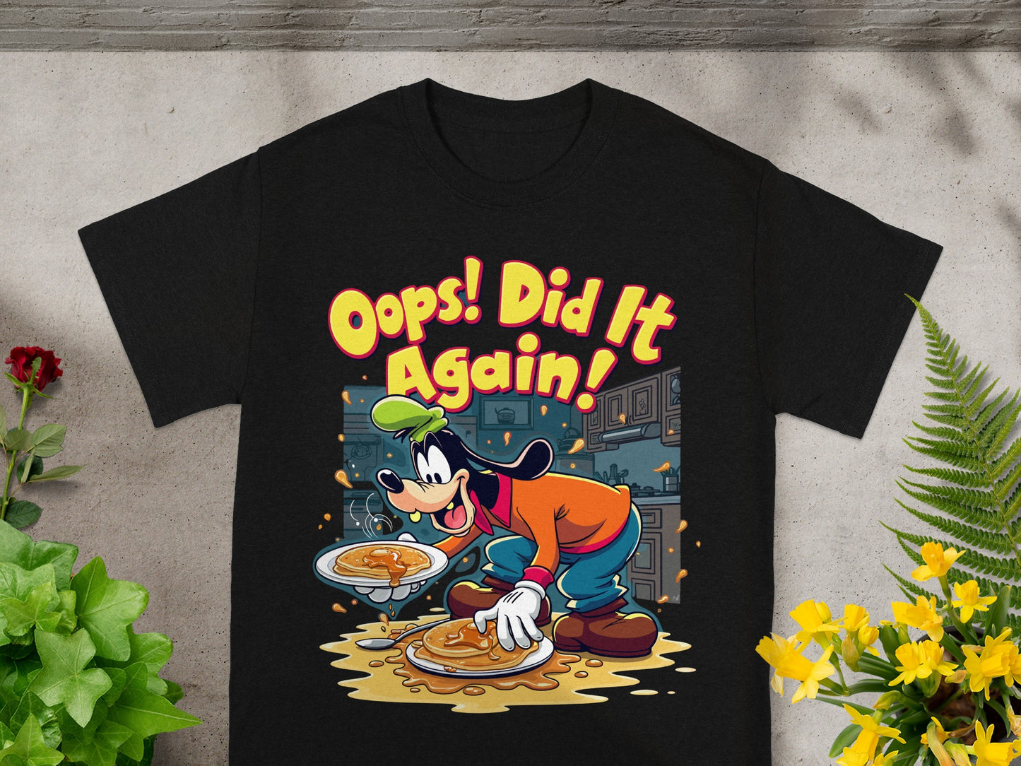 Goofy in kitchen with pancakes and text "Oops! Did it Again!"