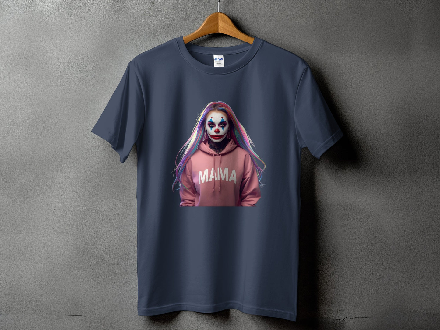 Dark gray t-shirt with a graphic of a person in clown makeup wearing a pink hoodie with "MAMA" text.