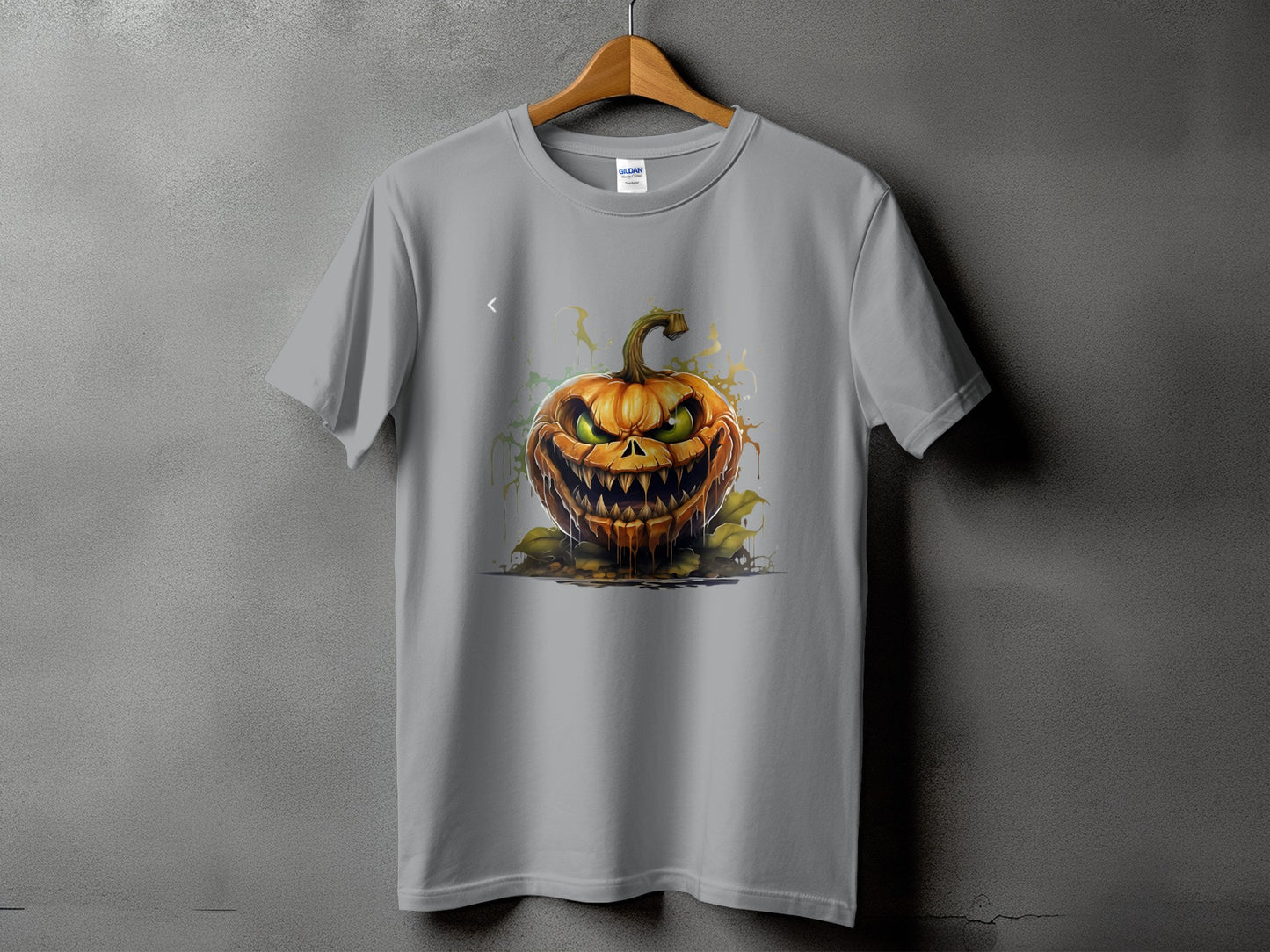 Grey t-shirt with a menacing jack-o'-lantern graphic on the front.