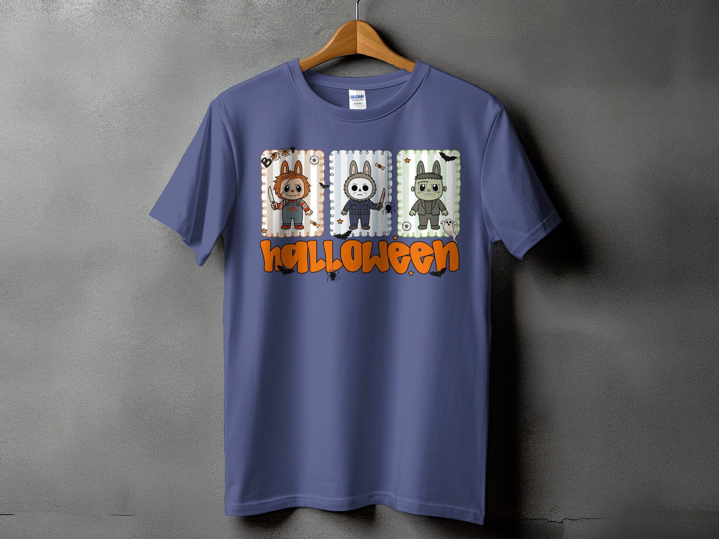 Purple t-shirt with cartoon Halloween characters and the word "Halloween."