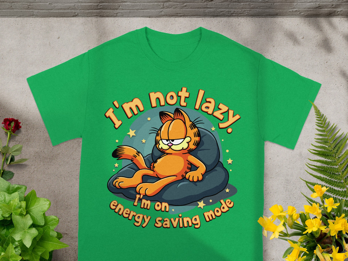 Green t-shirt with Garfield saying "I'm not lazy. I'm on energy saving mode."