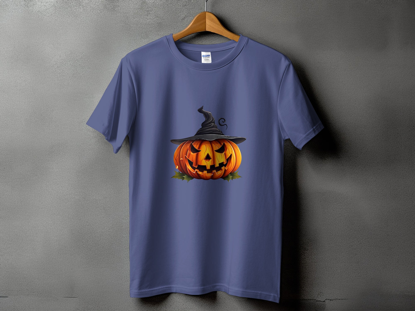 Purple t-shirt with a jack-o'-lantern wearing a witch hat design.
