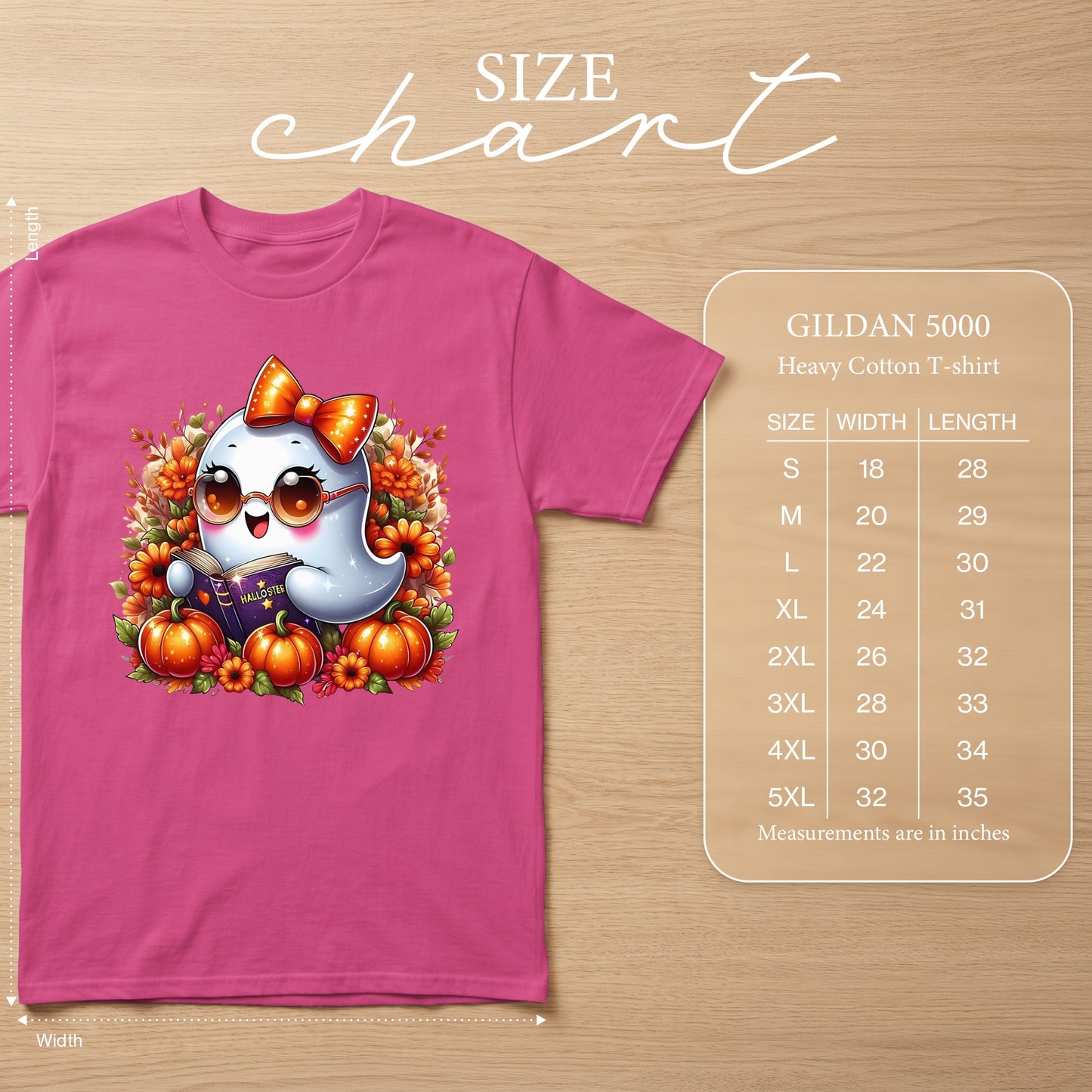 Pink t-shirt with a cute ghost reading a book, surrounded by pumpkins and flowers.