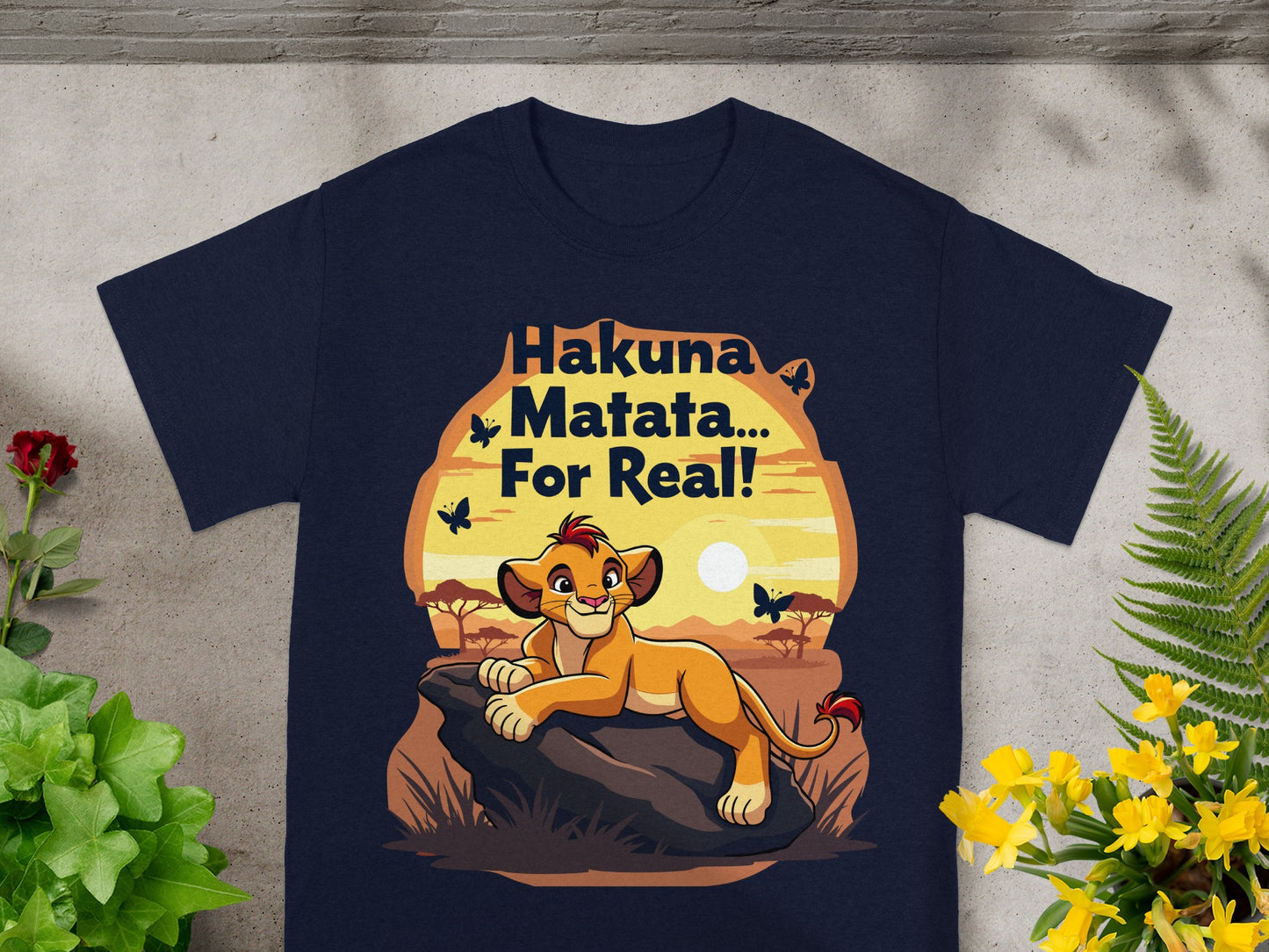 Navy t-shirt with Simba from The Lion King and "Hakuna Matata... For Real!" text.