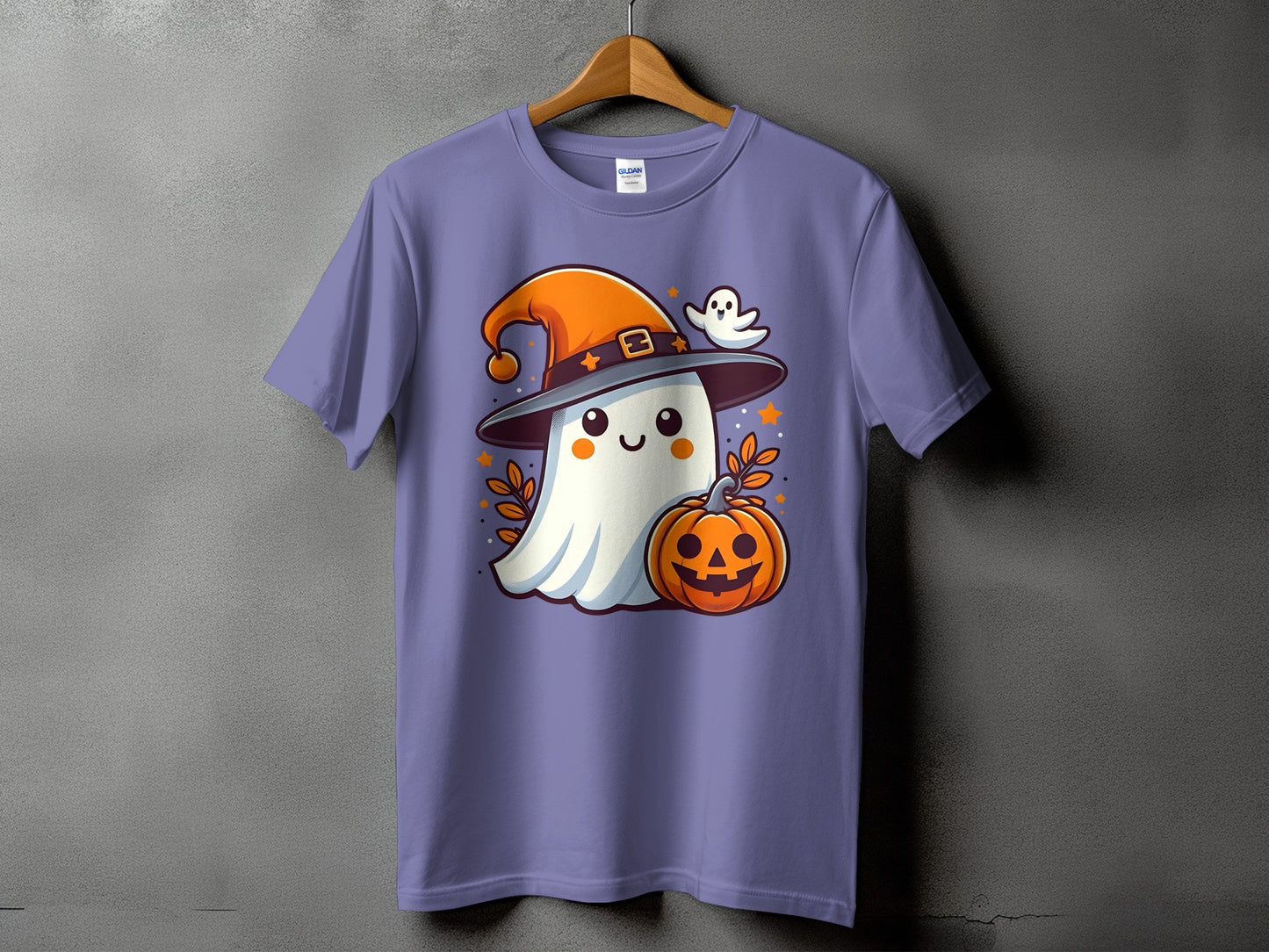 Purple t-shirt with a cute ghost, witch hat, and jack-o'-lantern graphic.