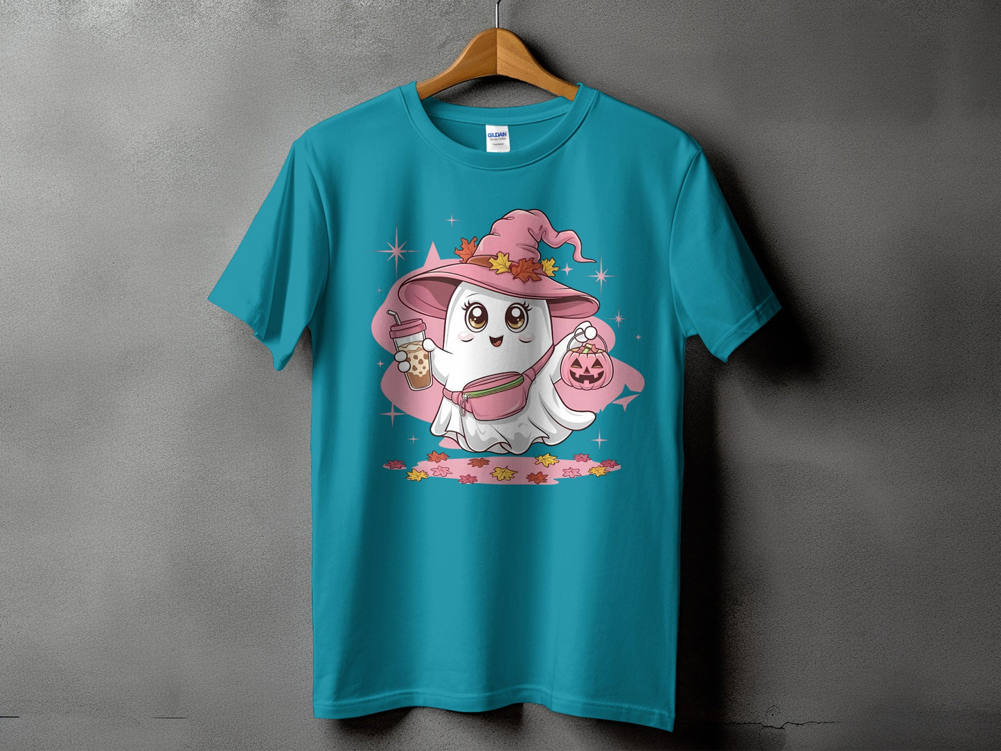 Teal t-shirt with a cute ghost wearing a witch hat holding a bubble tea and pumpkin.
