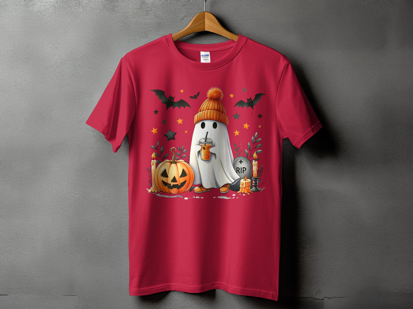 Red t-shirt with ghost, pumpkin, bats, stars, candles, and a RIP tombstone.