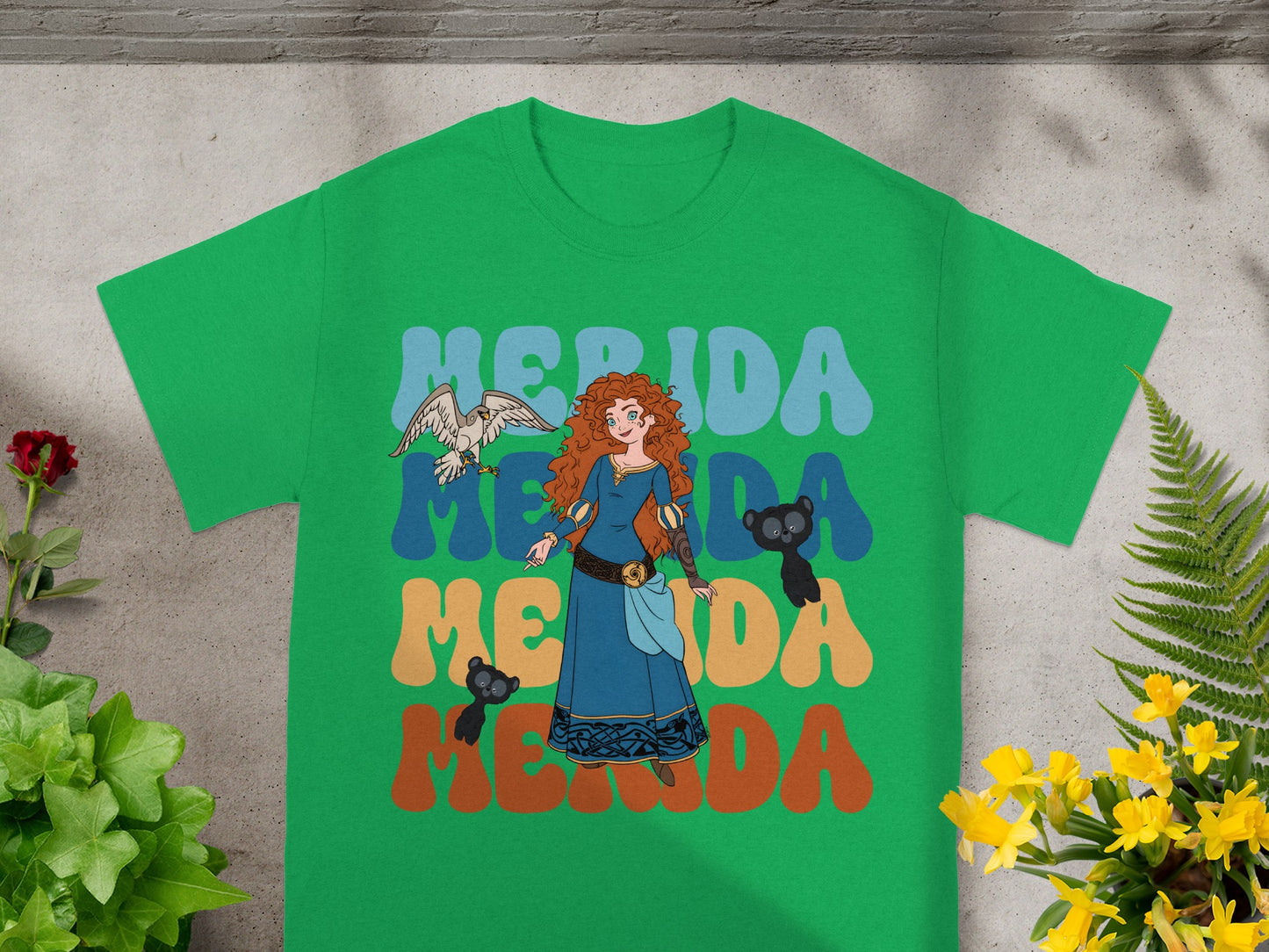 Merida from Brave with animal companions on a green t-shirt.