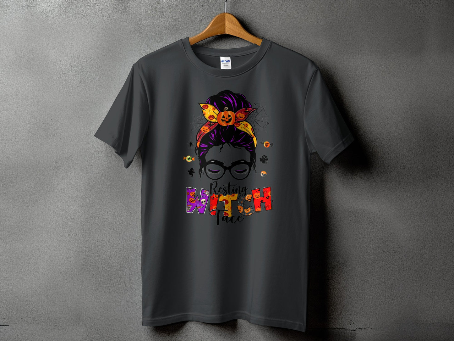 Dark gray t-shirt with Halloween graphic reading "Resting Witch Face".