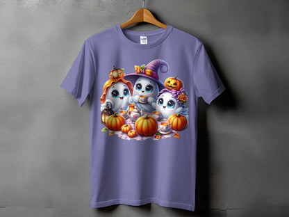 Three cute ghosts enjoy tea with pumpkins and a lantern on a purple t-shirt.