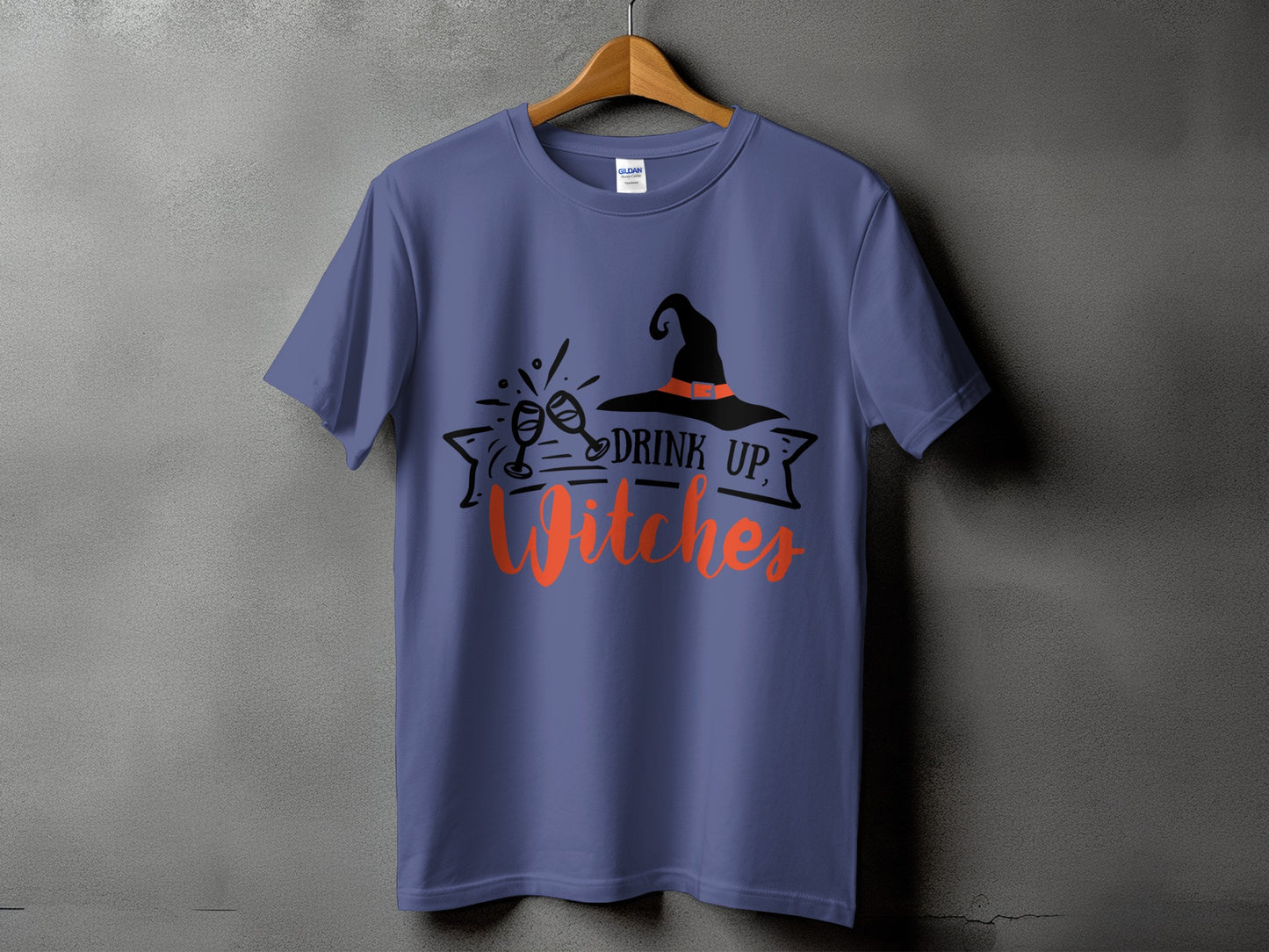 Purple t-shirt with "Drink Up, Witches" Halloween graphic and witch hat.