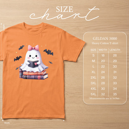 Orange Gildan 5000 t-shirt with a cute ghost reading books and bats design.