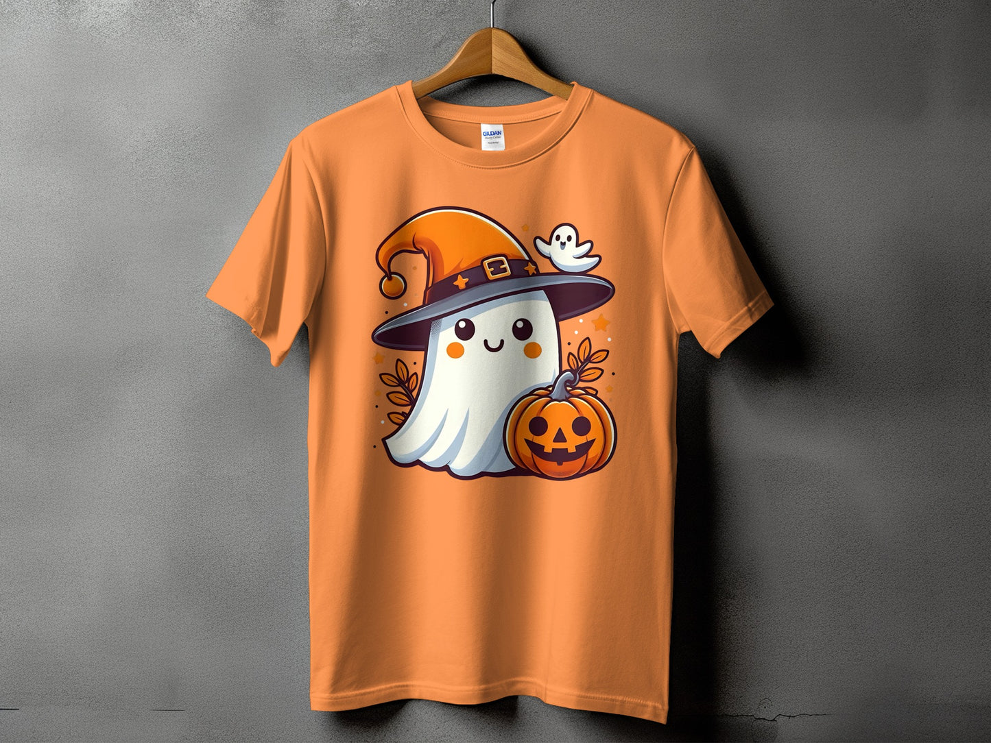 Orange t-shirt with cute ghost, pumpkin, and ghost wearing Halloween hat.