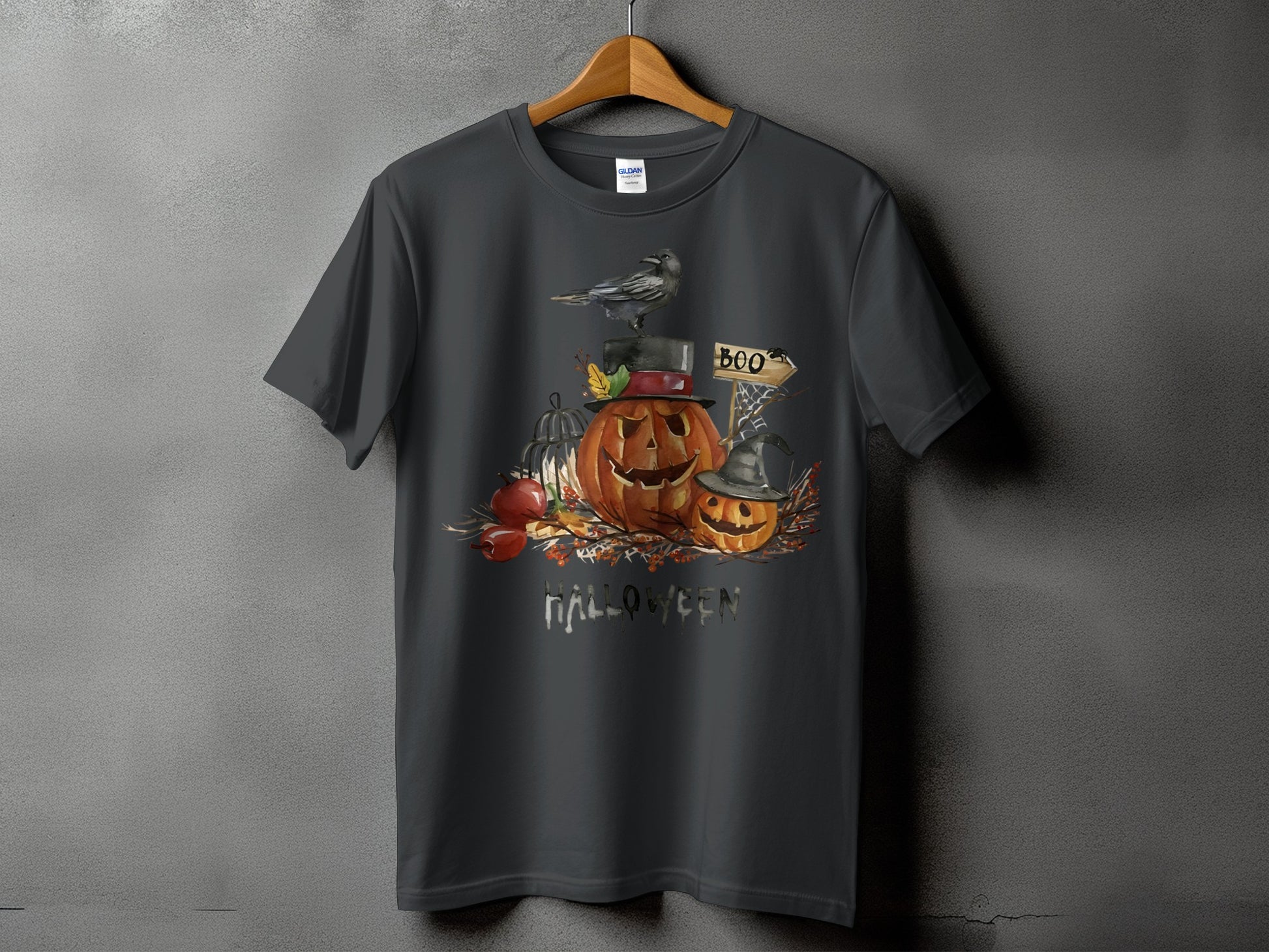 Dark grey t-shirt with a Halloween graphic featuring pumpkins, a crow, and the word "HALLOWEEN".