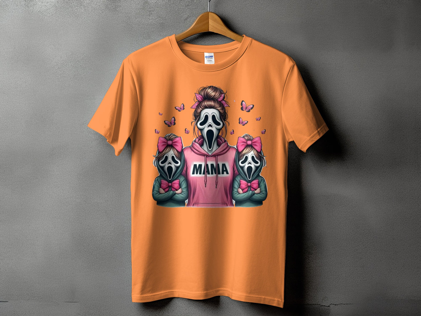 Orange t-shirt with ghost masks and "Mama" text graphic.