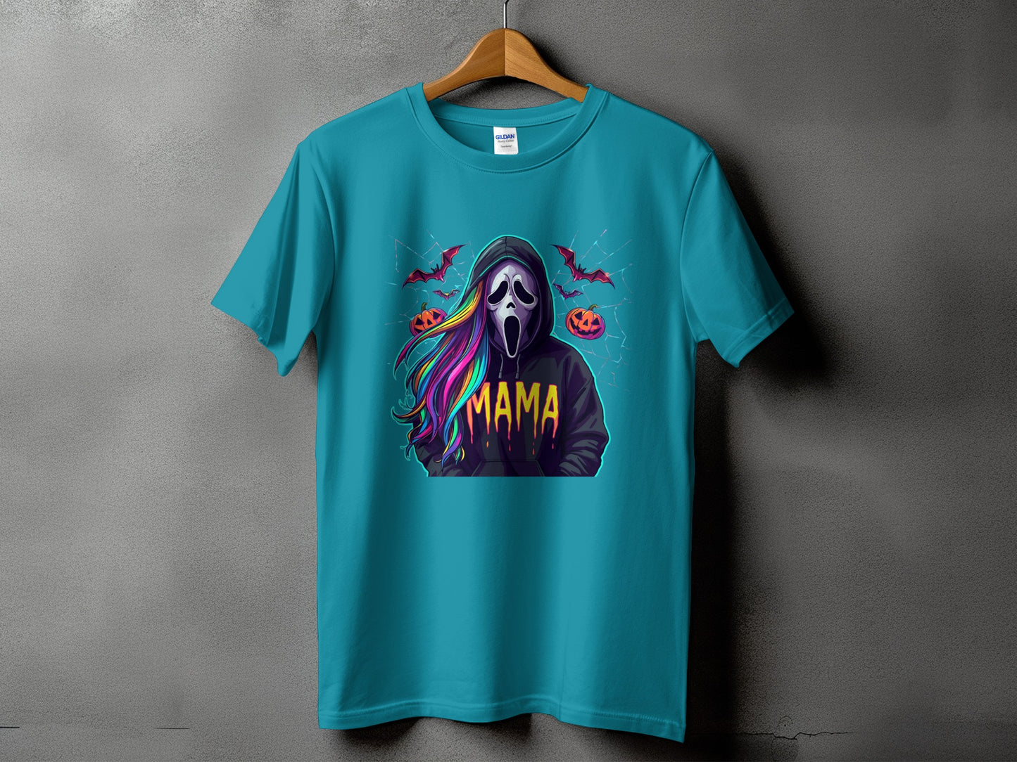 Teal t-shirt with a scream mask graphic and "MAMA" text, Halloween themed.