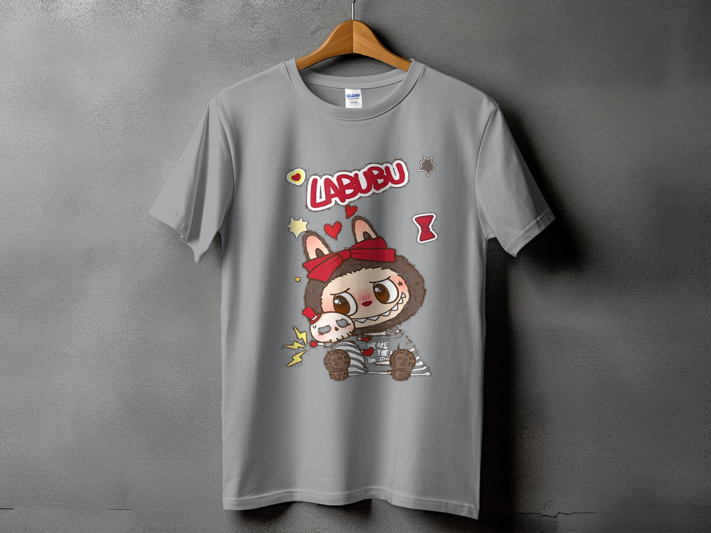 Grey t-shirt with "LABUBU" text and a cartoon character holding a skull.