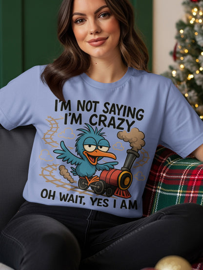 Blue bird on a train with text "I'm not saying I'm crazy, oh wait, yes I am."