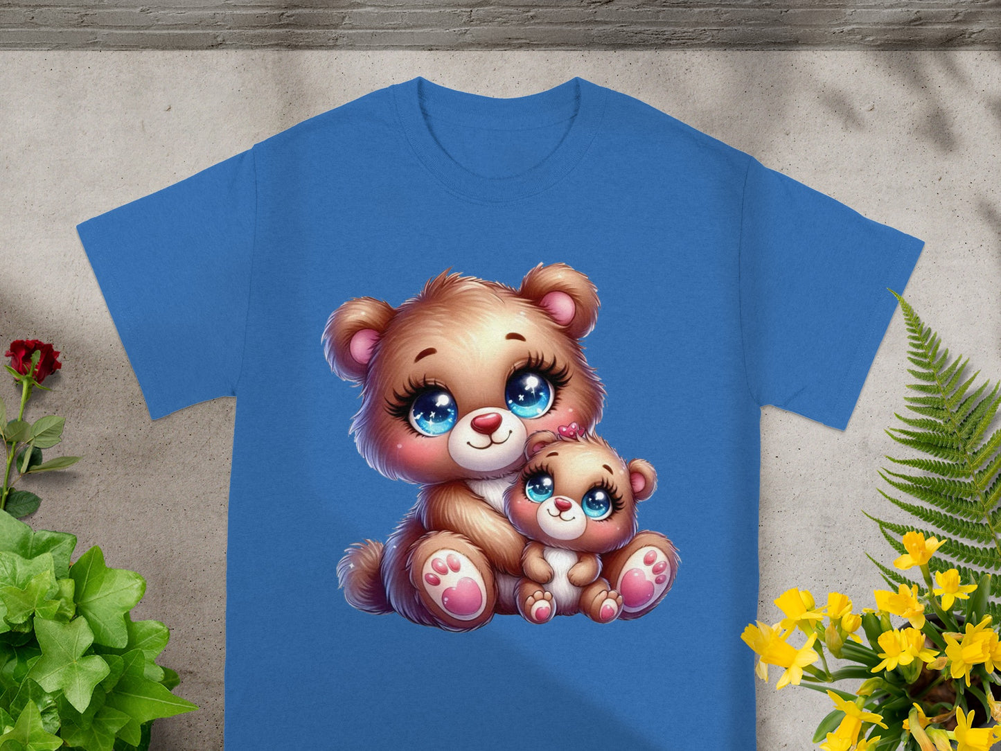 Two cartoon teddy bears, one large and one small, sit together smiling.