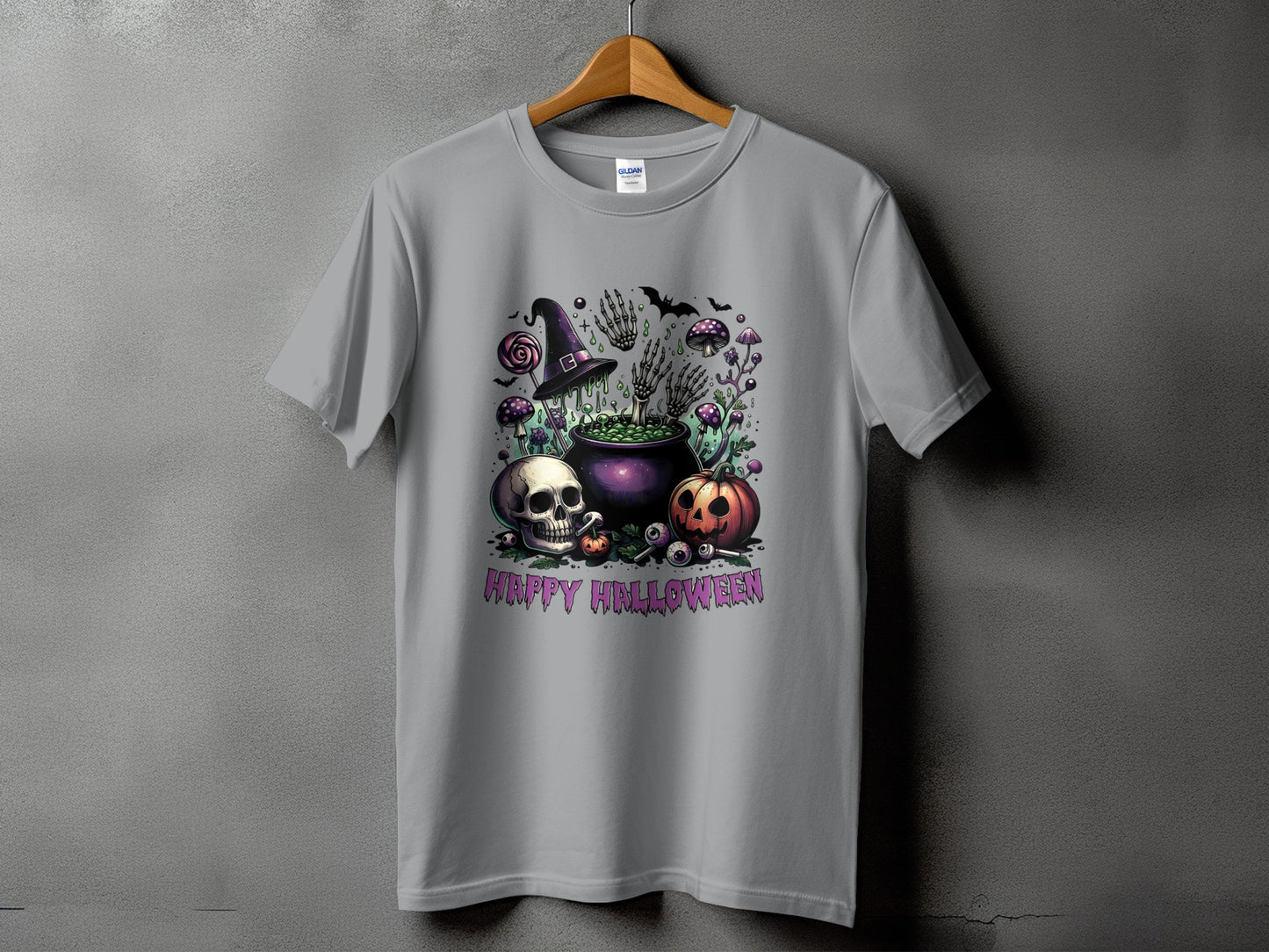Grey t-shirt with Halloween graphic featuring cauldron, skull, pumpkin, bats, and "Happy Halloween" text.