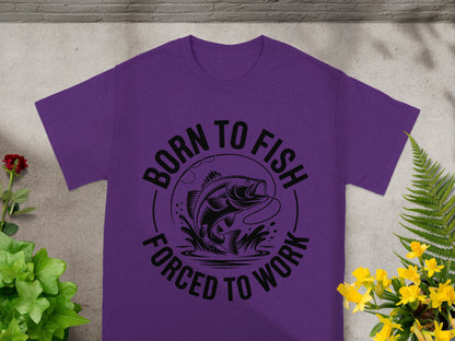 Purple t-shirt with black graphic of a bass fish being reeled in, text reads "Born to Fish, Forced to Work."