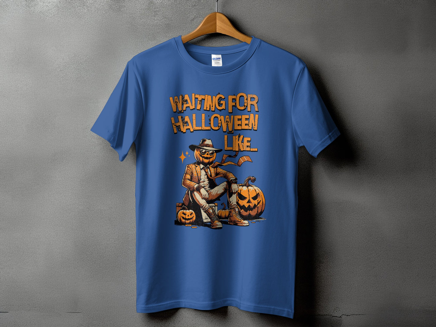 Blue t-shirt with "Waiting For Halloween Like" text and pumpkin character graphic.