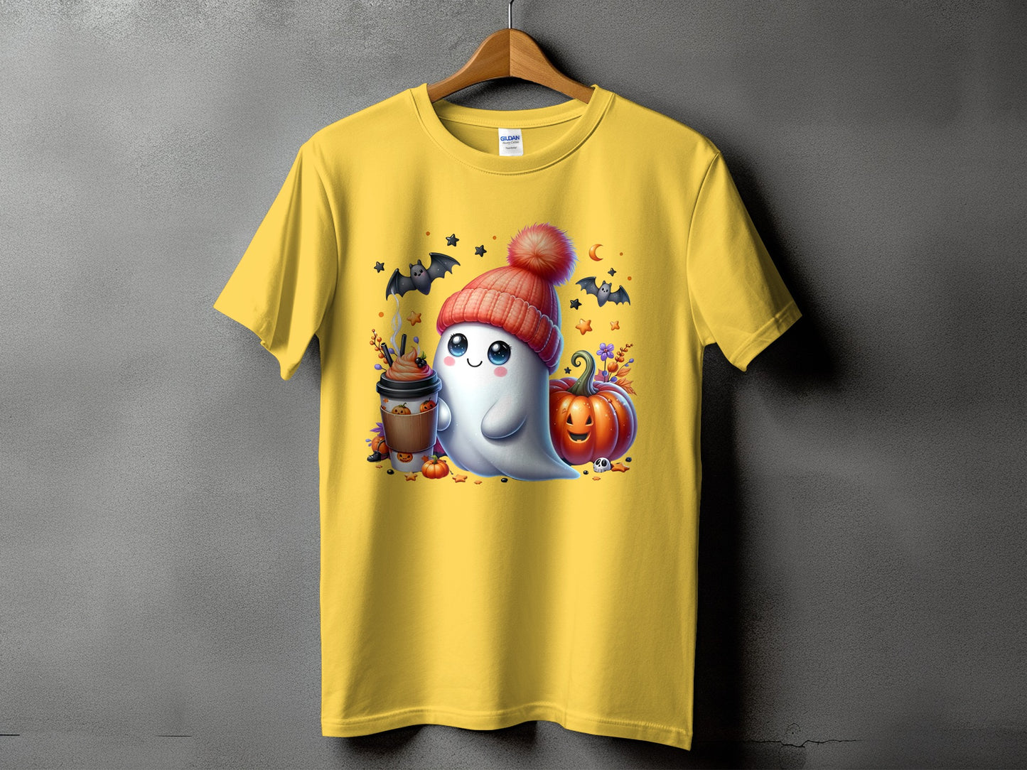 Yellow t-shirt with Halloween ghost, pumpkin, coffee cup, and bats graphic.