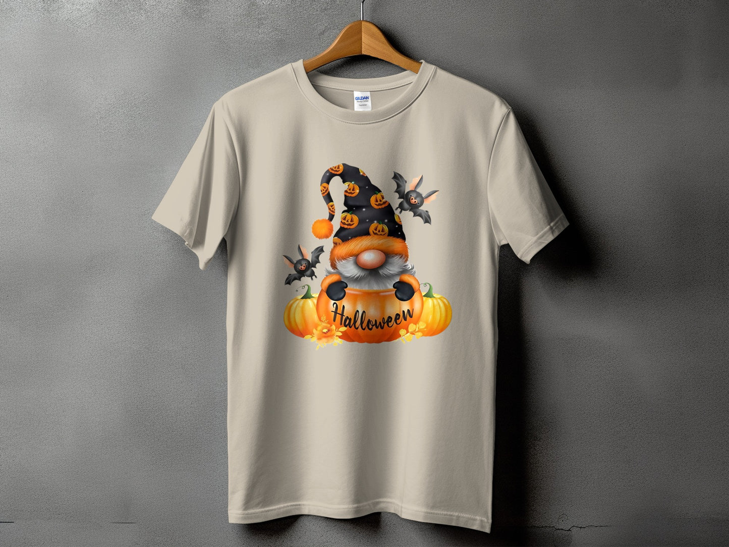 Gnome with pumpkins and bats, wearing Halloween-themed hat, text reads "Halloween".