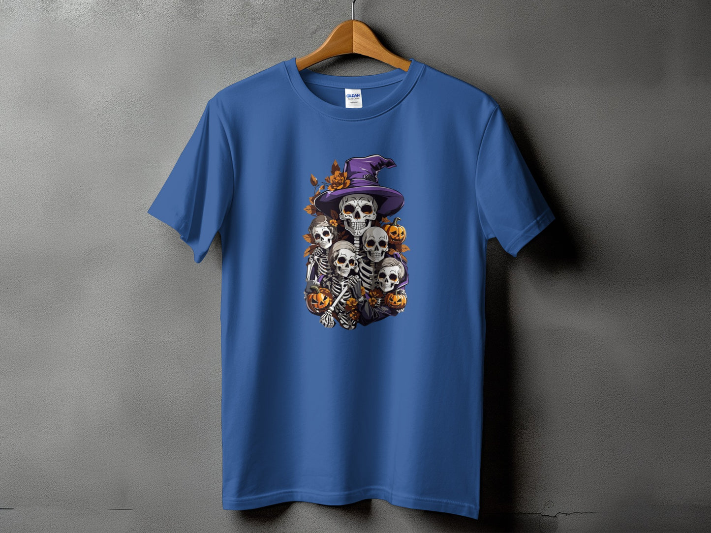 Blue t-shirt with Halloween skeleton graphic and purple witch hat.