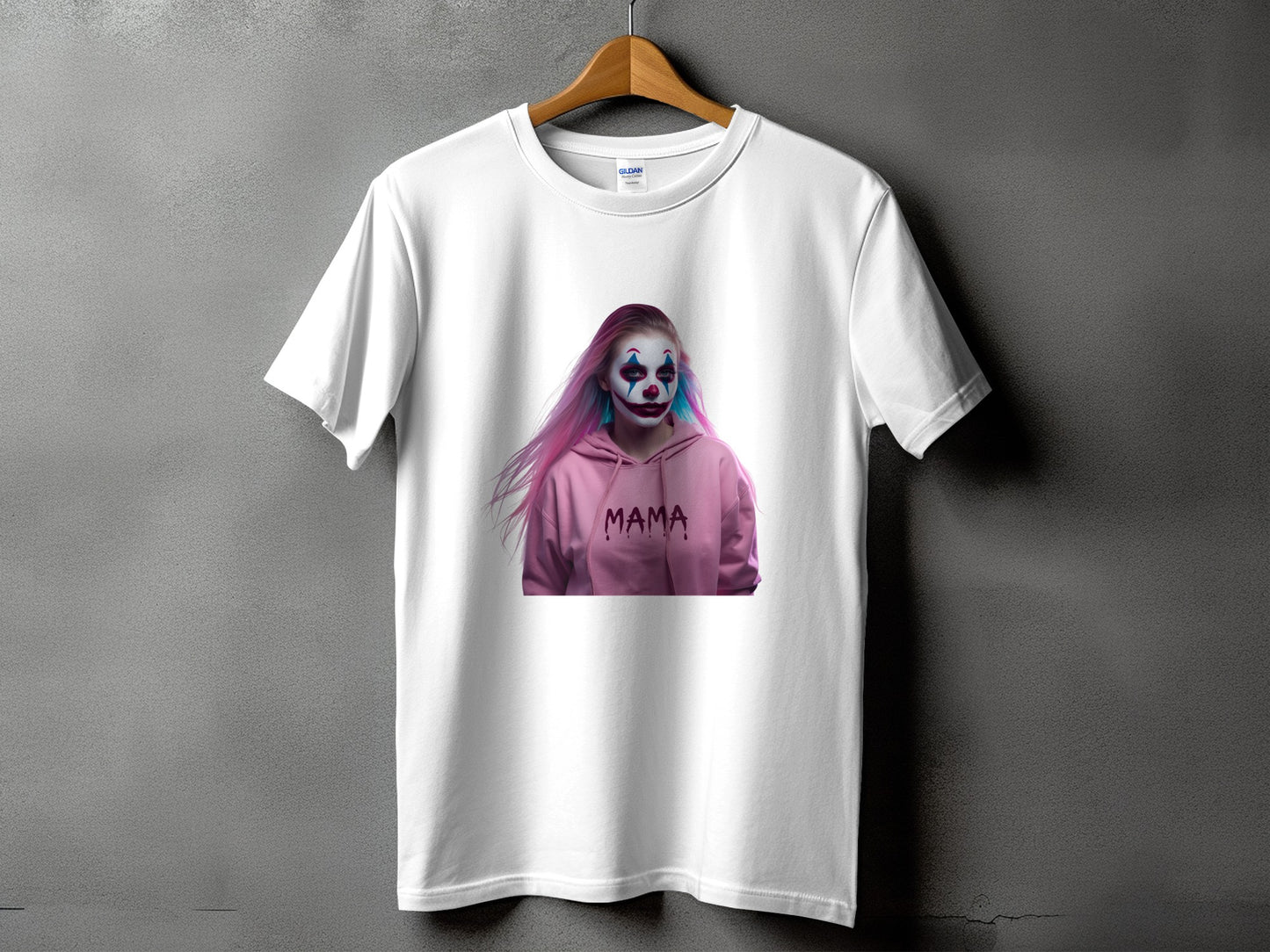 White t-shirt with a graphic of a person in clown makeup and pink hair, saying "MAMA".