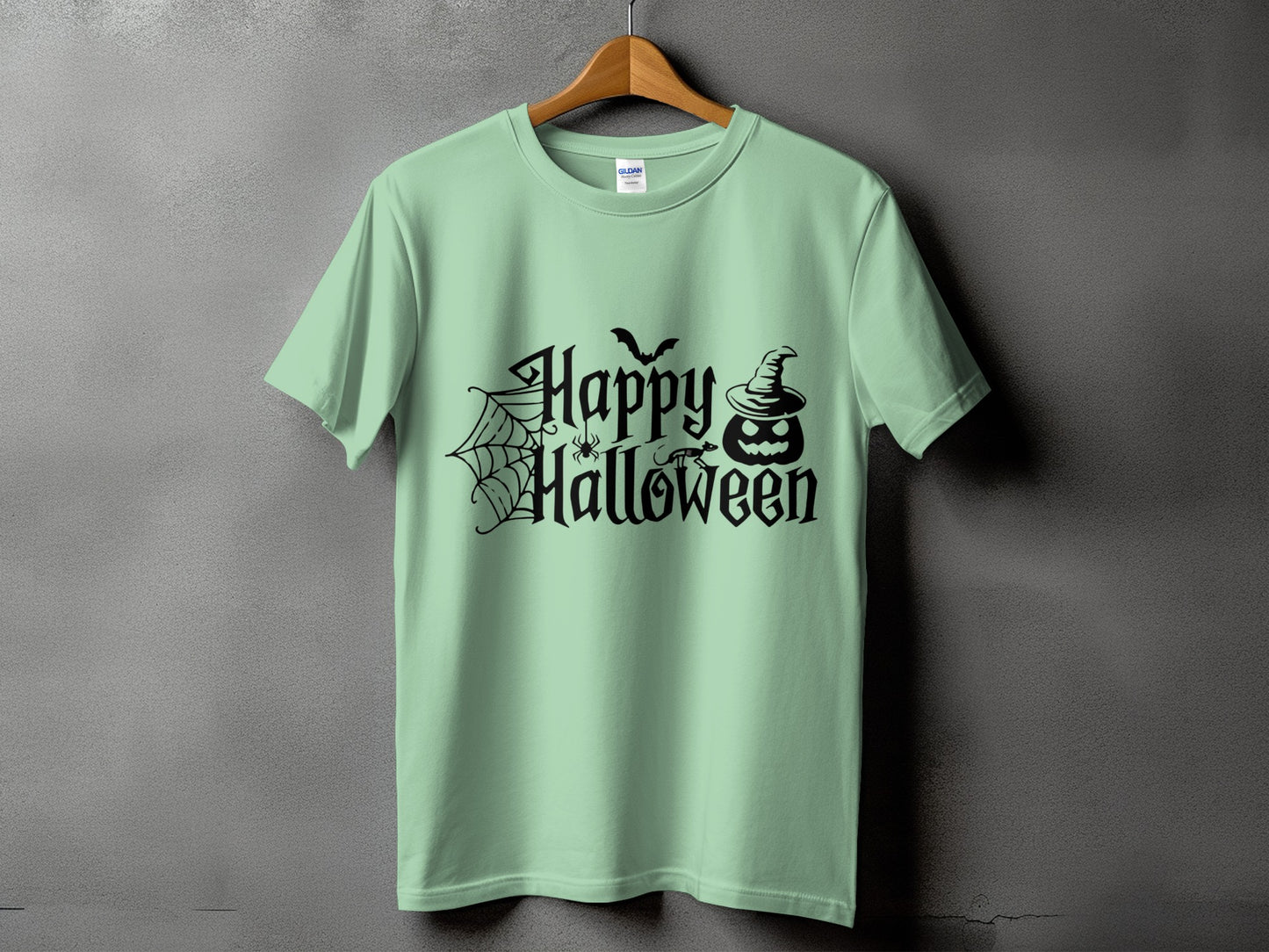 Light green t-shirt with black "Happy Halloween" text, spider, bat, and jack-o'-lantern.