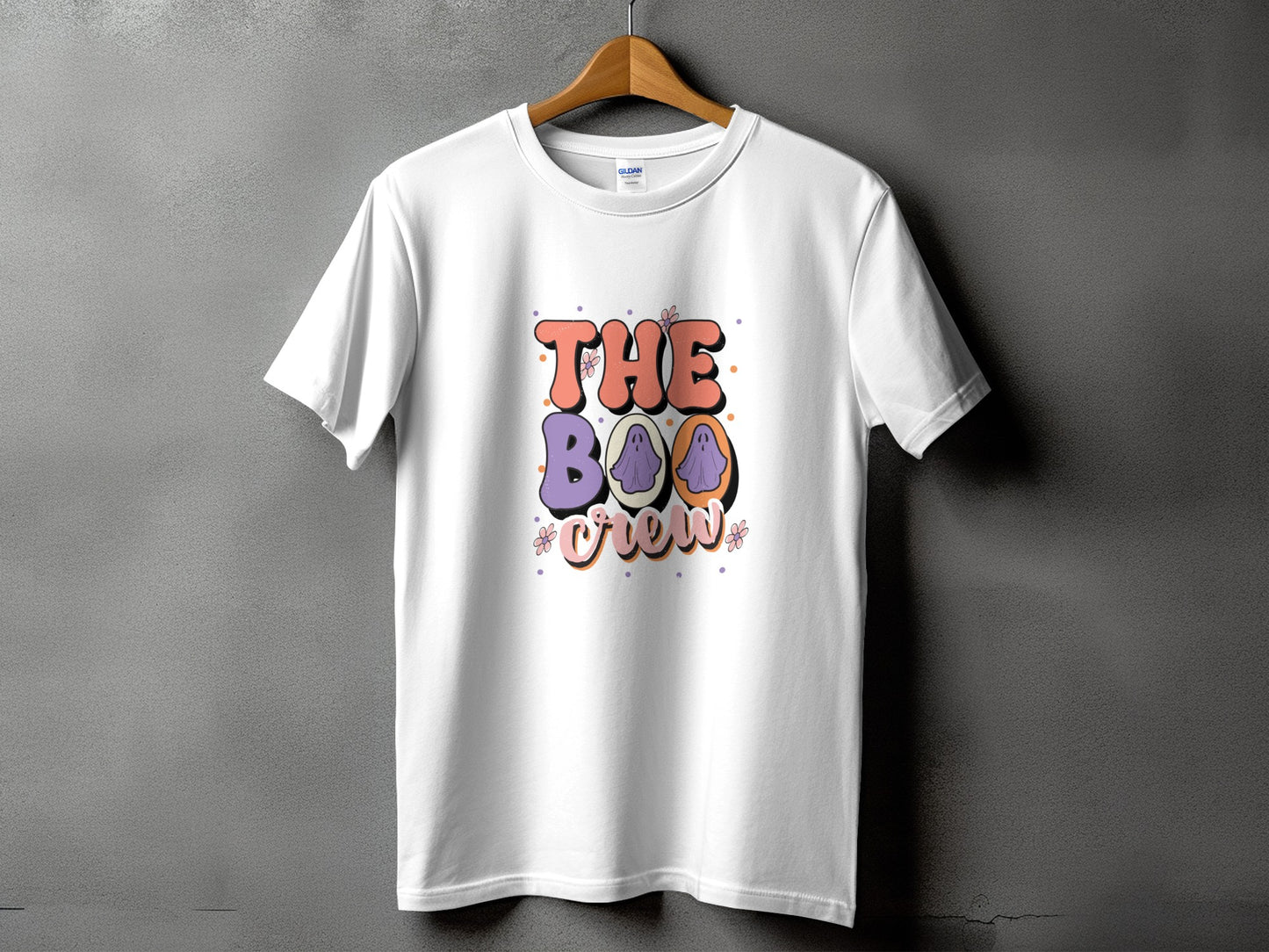 White t-shirt with "The Boo Crew" text and purple ghost graphics.