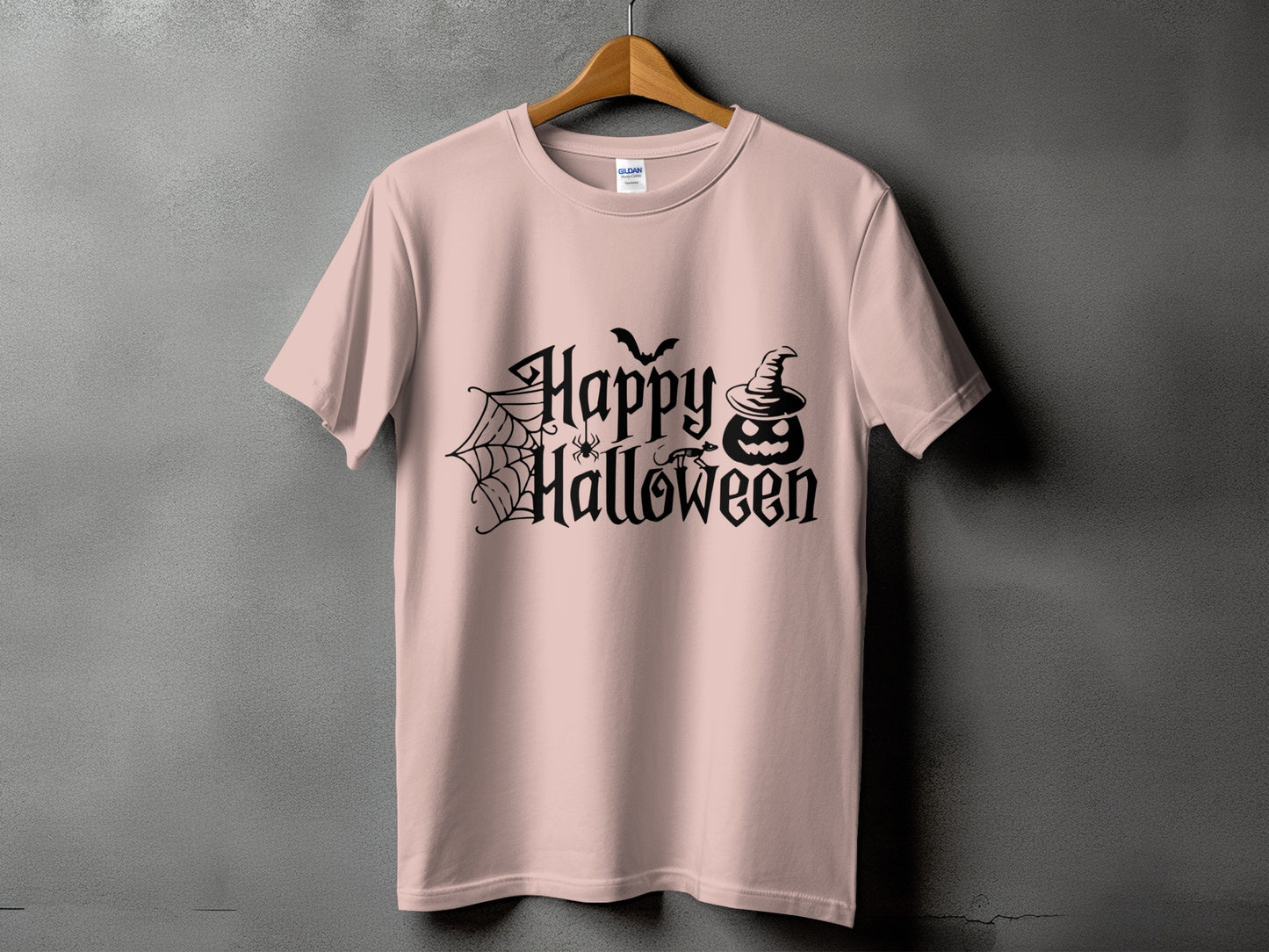 Pink t-shirt with black "Happy Halloween" text, spider, web, bat, and pumpkin.